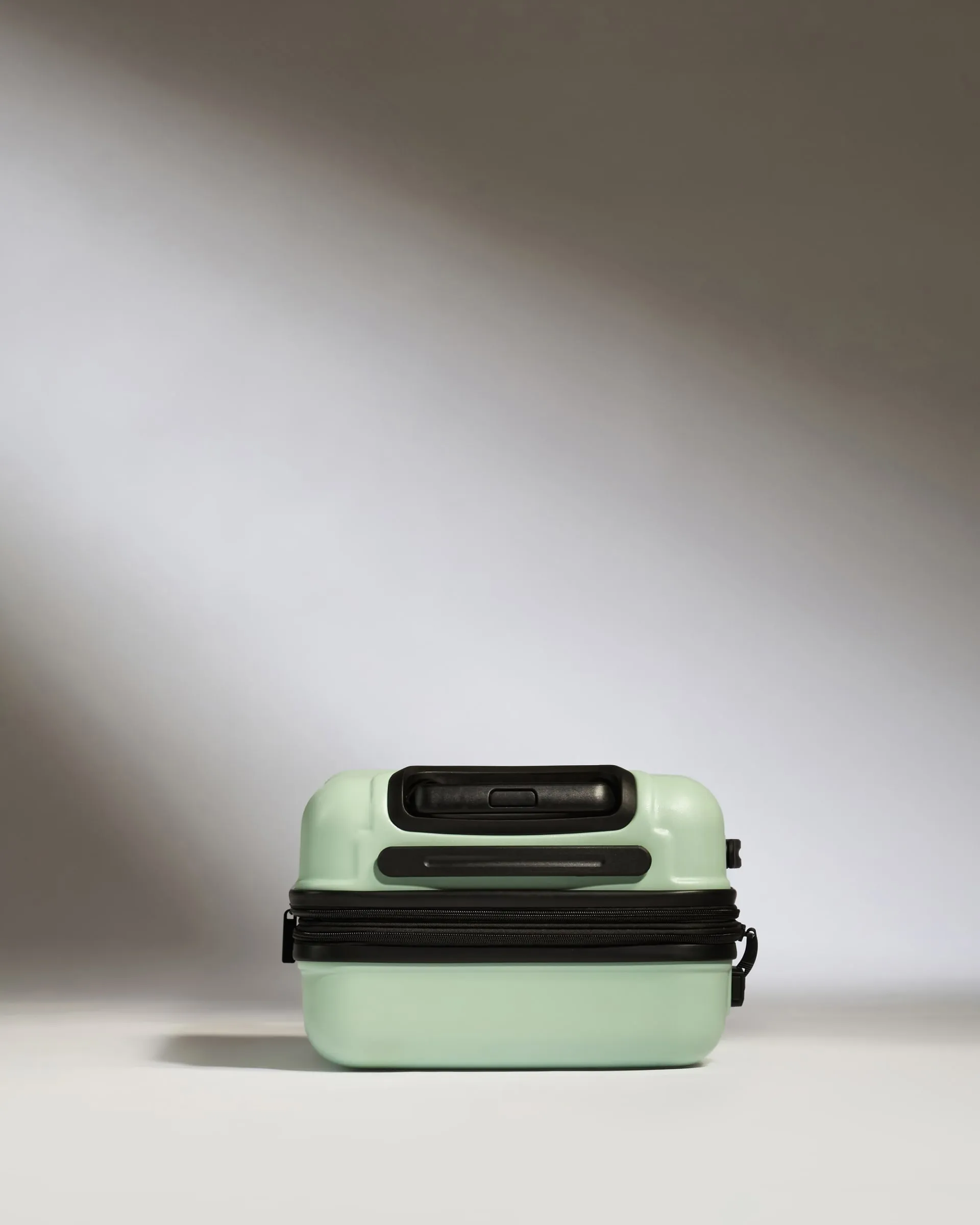 Expandable Carry-on Luggage in Aspen Green - Logo